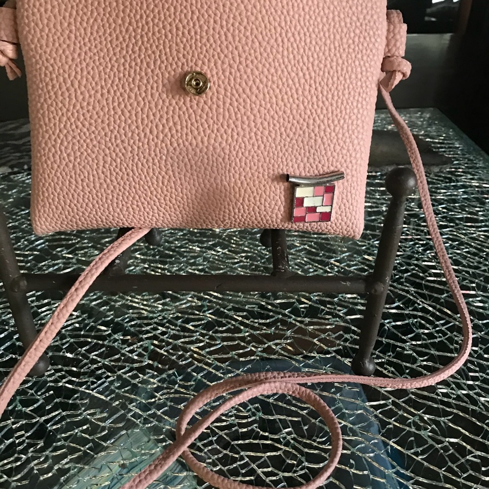 Leather cross over Purse. Colors is as pictured,